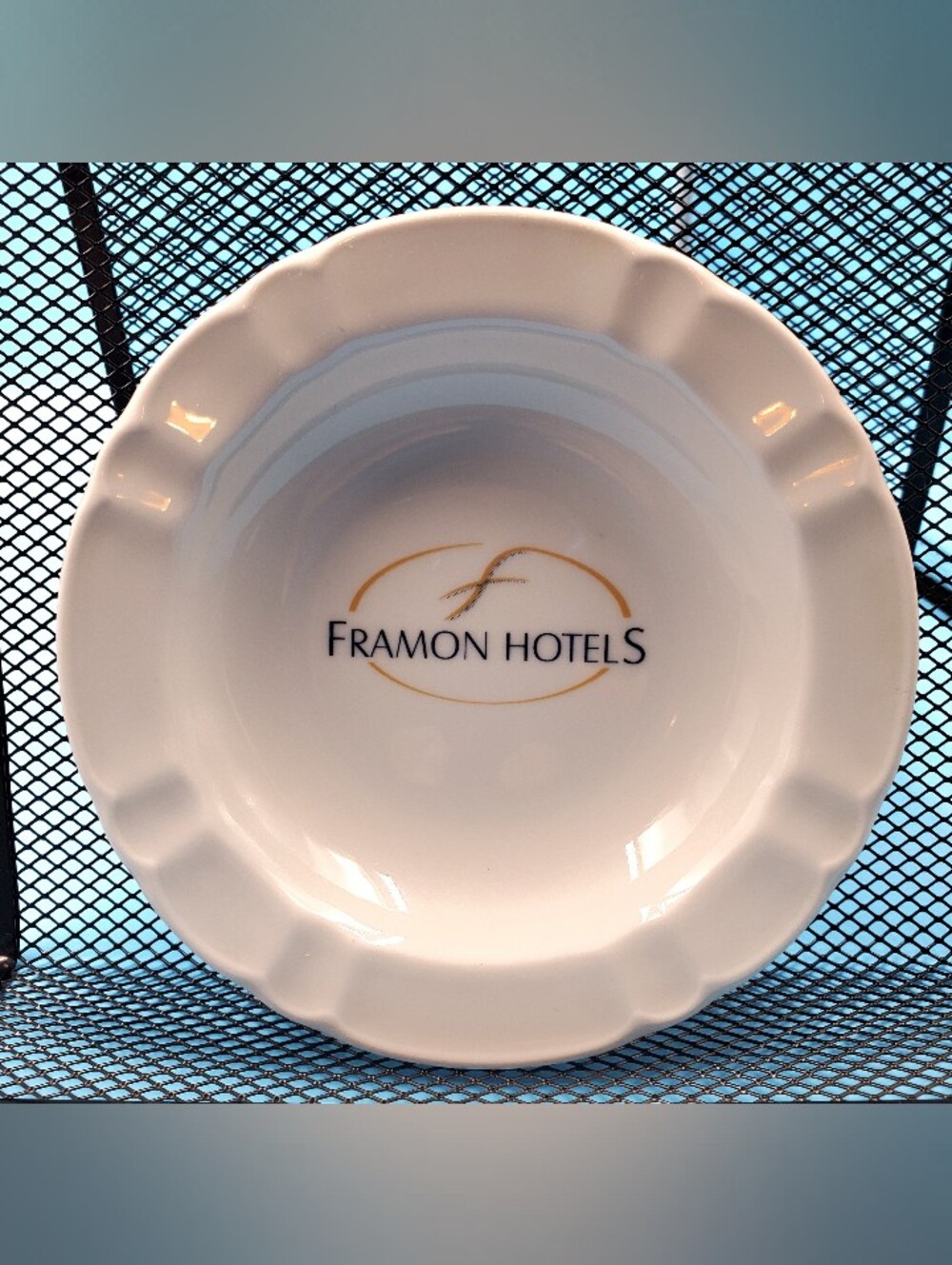 Vintage white ceramic ashtray with the logo of Framon Hotels, made in Germany